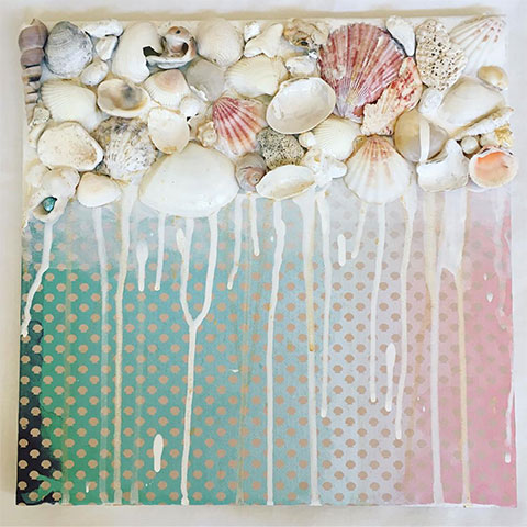 3D art created with shells, patterned paper, and dripped paint